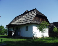 Roubený dům s venkovní hliněnou omítkou, Muzeum Sighetu Marmației, Rumunsko.